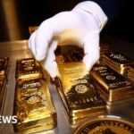 Gold price hits record high as investors seek safety